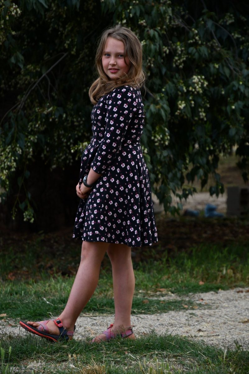 Girl walking in sandals outside